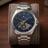 Ανδρικό Tommy Hilfiger Automatic ασημί ατσάλινο ρολόι με μπλε skeleton καντράν