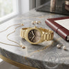 Armani Exchange Sync Quartz Brown Dial Ladies Watch με Xρυσό Μπρασελέ