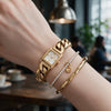 Ρολόι Γυναικείο Michael Kors Emery Χρυσό με Τετράγωνο Καντράν και Σετ Βραχιόλια MK7655SET